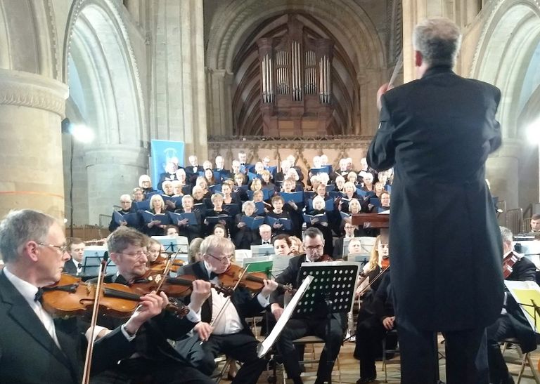 Choir, orchestra and conductor